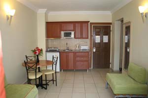 4 person standard 1 room apartment and 2 children with balcony, an extra bed, and private facilities (bath)